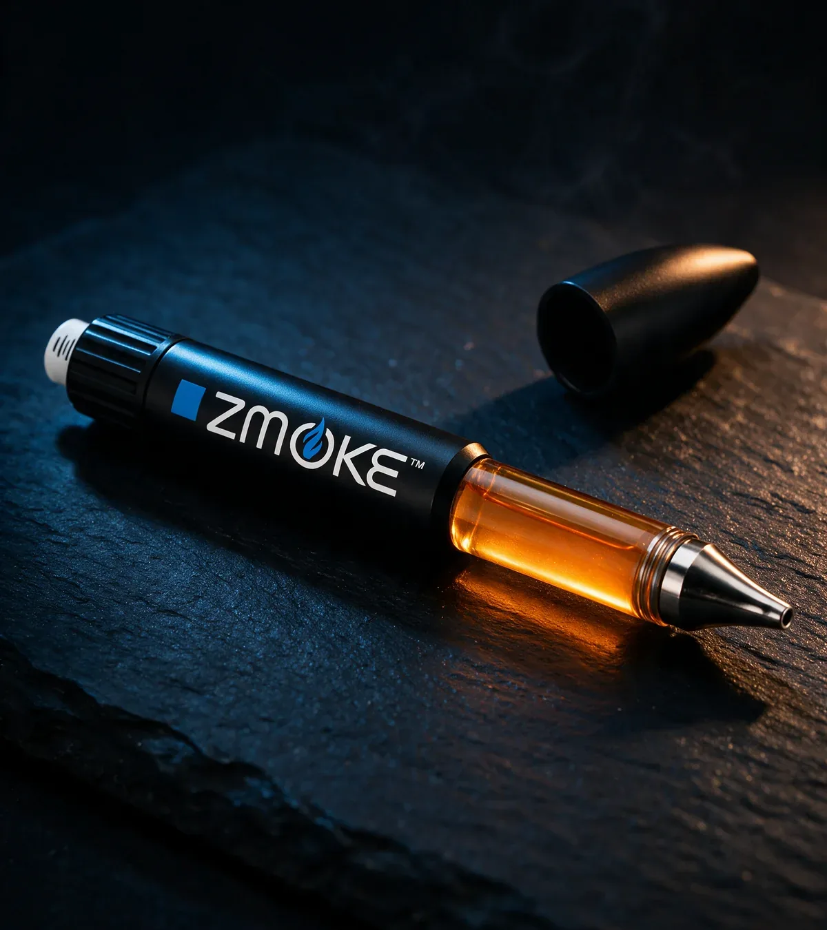 Blue Sativa ZMOKE applicator staged on dark slate with the cap removed